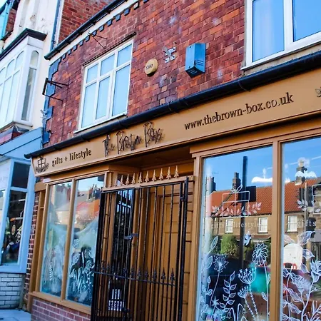 The Brown Box Let * Loftus